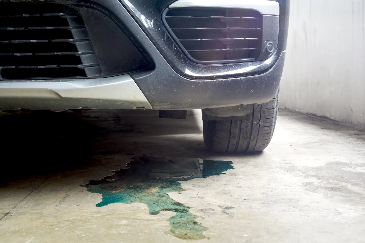 Puddle of coolant under car