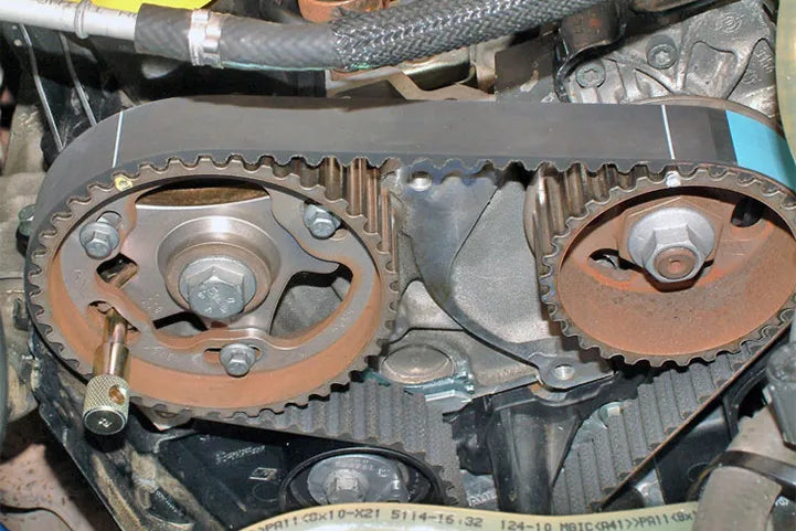 A timing belt on a car engine