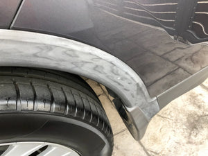 Faded black plastic trim on a car