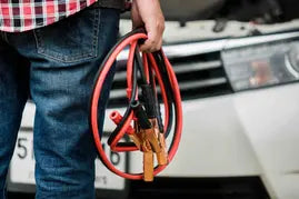 Carrying jump leads to a car