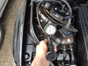 How to use a pressure tester to find a coolant leak