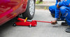 Car jack used to raise a car