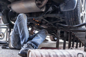 Car ramps being used by a mechanic