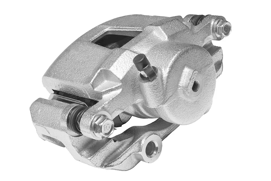 A brake caliper in situ on a car