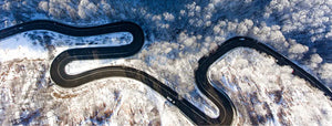 An icy twisty road from above
