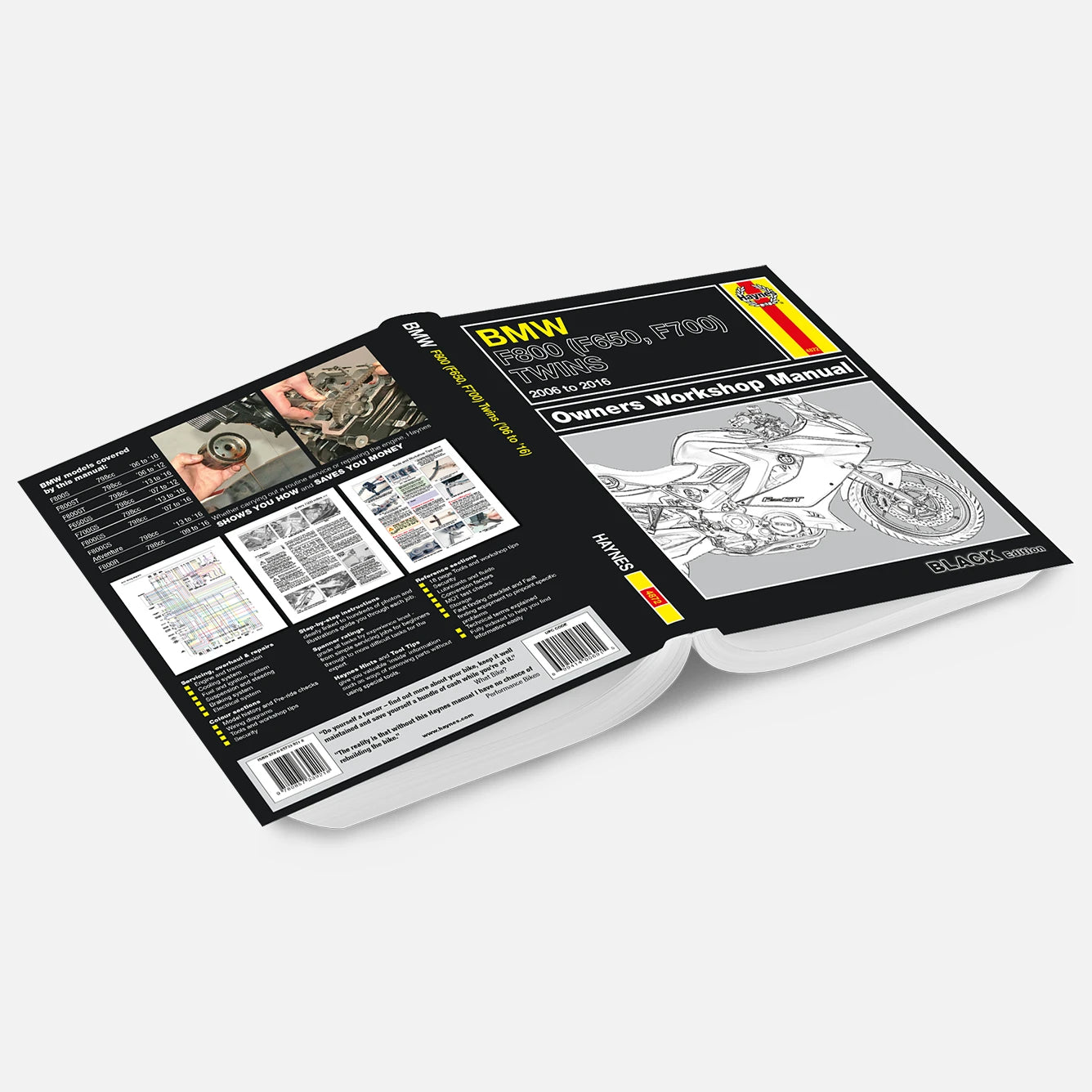 Open BMW motorcycle workshop manual on a white background