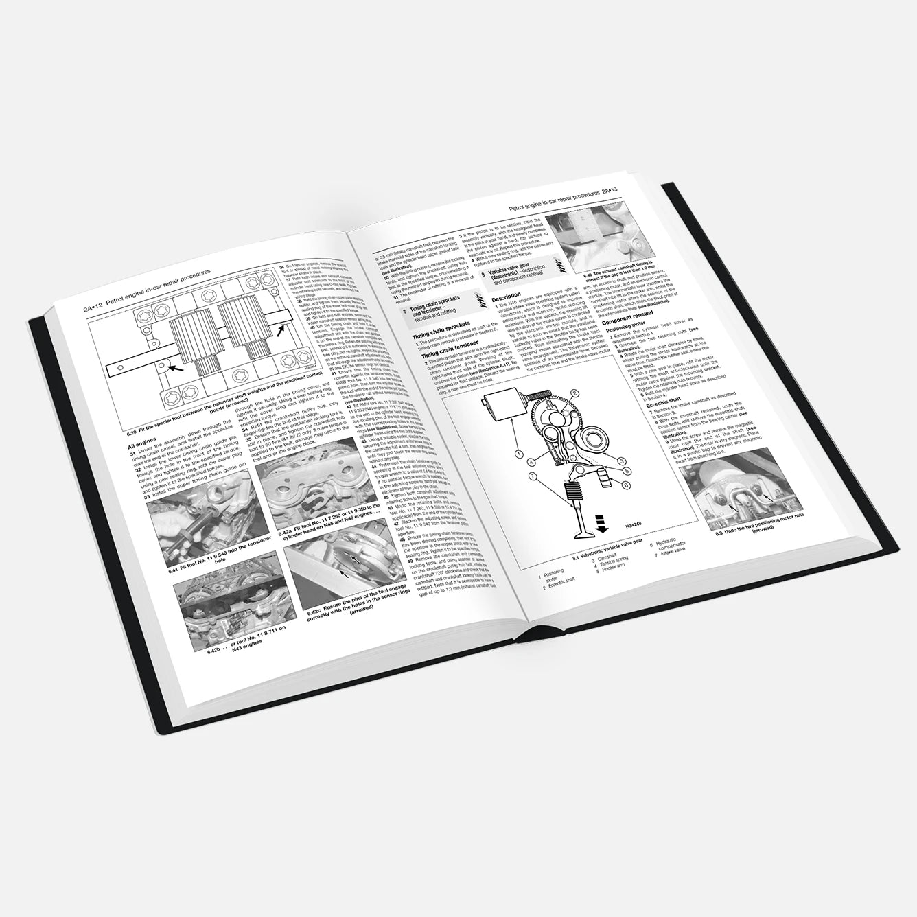 Open book with technical illustrations and text on a white background