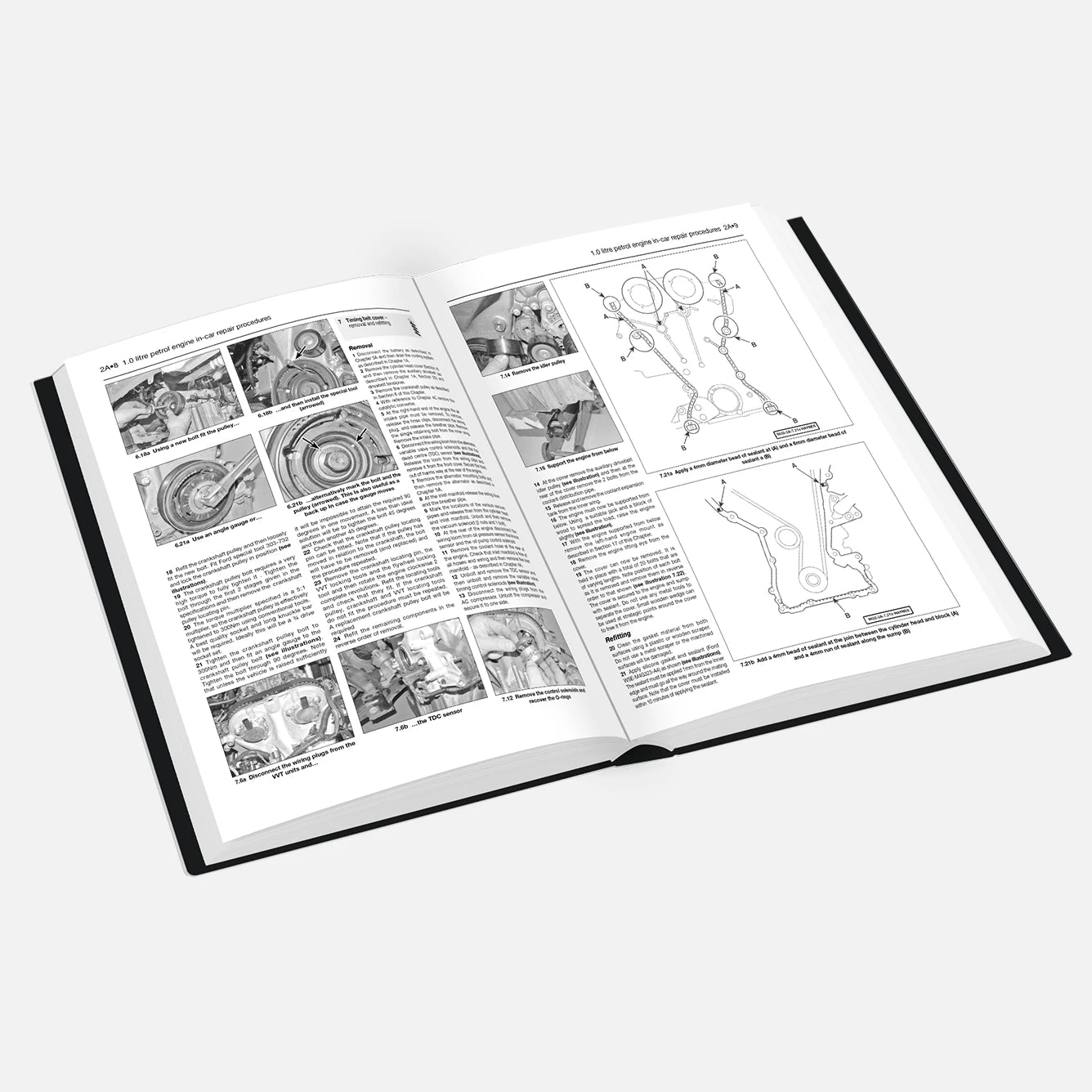 Open book with technical illustrations and text on a white background