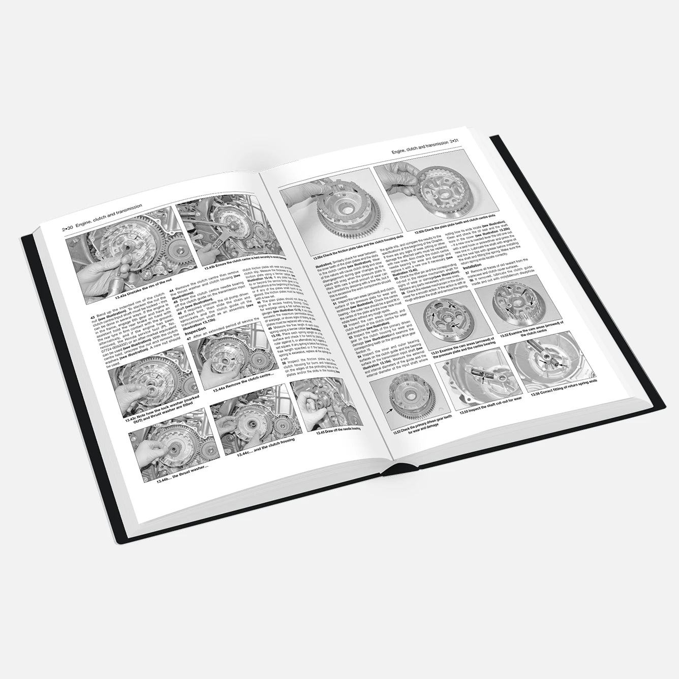 Open book with technical illustrations and text on a white background