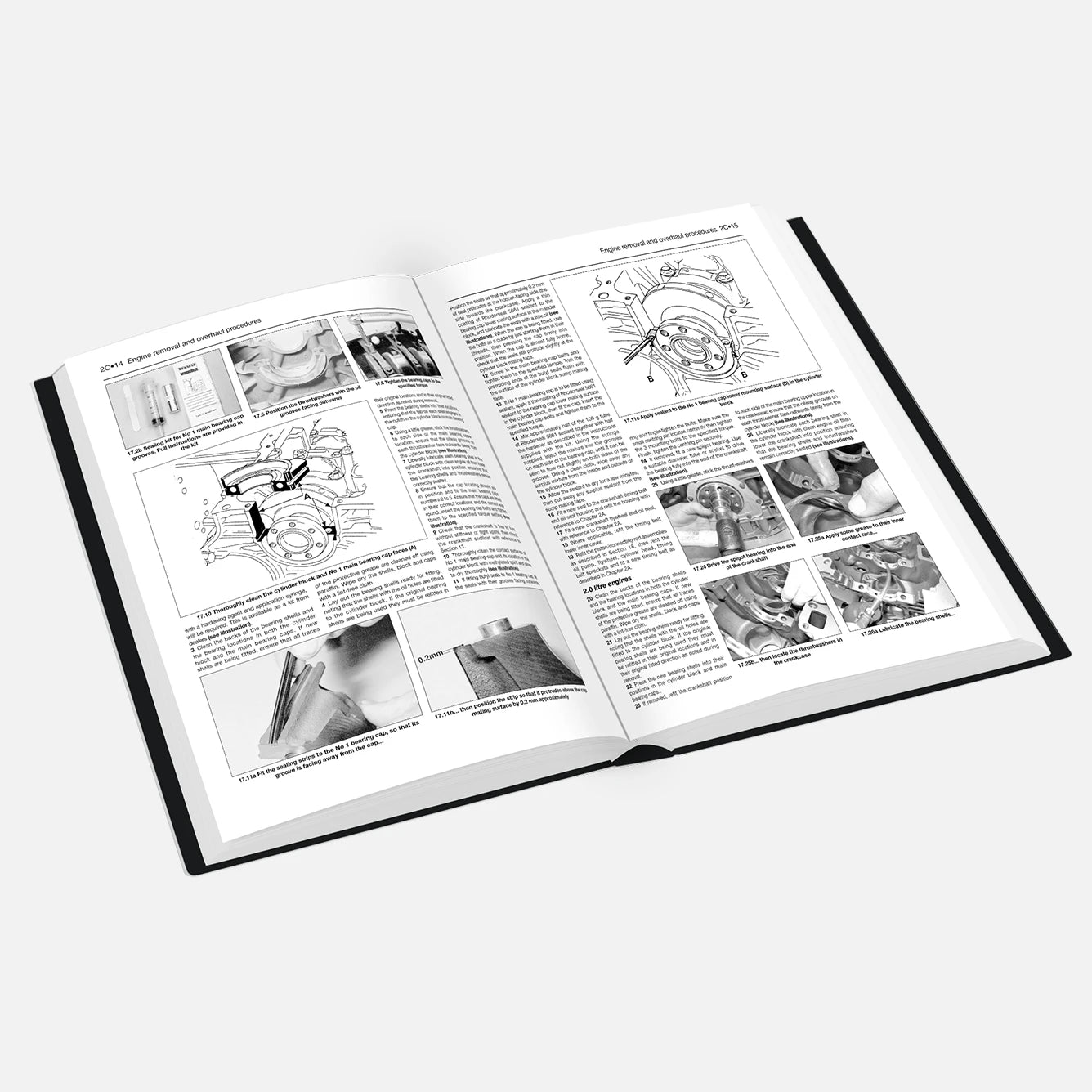 Open book with technical illustrations and text on a white background