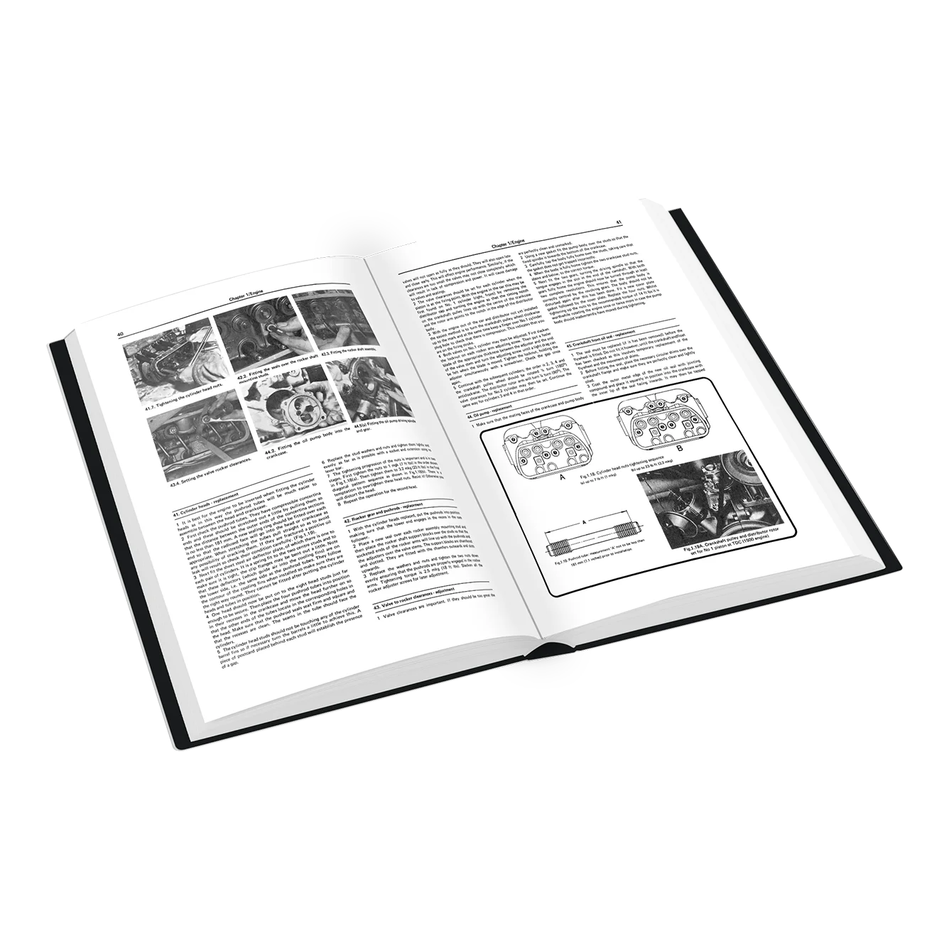 An open hardcover manual or book showing printed technical diagrams, text blocks, and small black-and-white photos on white pages, photographed on a light gray background.