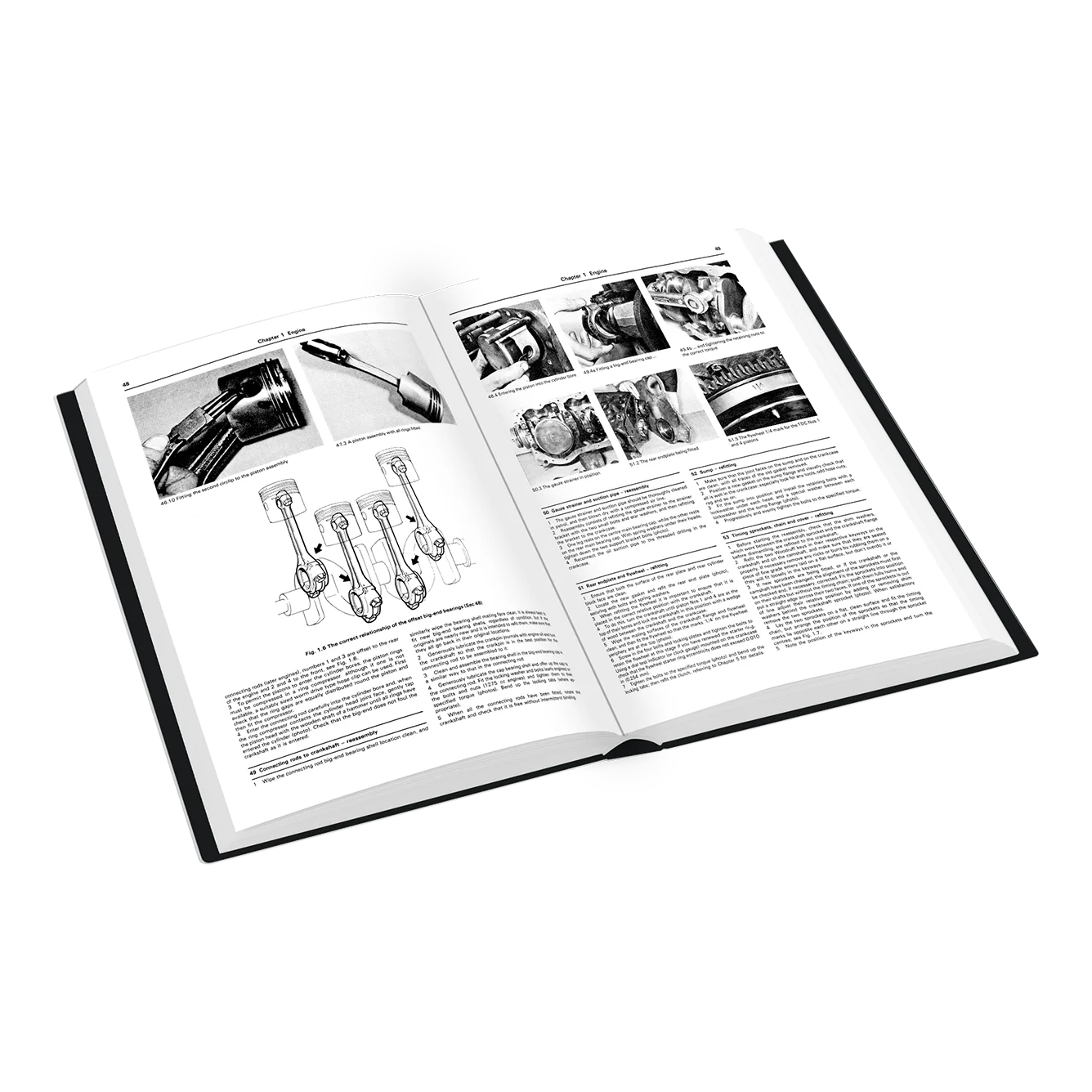 An open hardcover book showing black-and-white technical pages with engine diagrams, photos, and columns of text, photographed on a clean white background.
