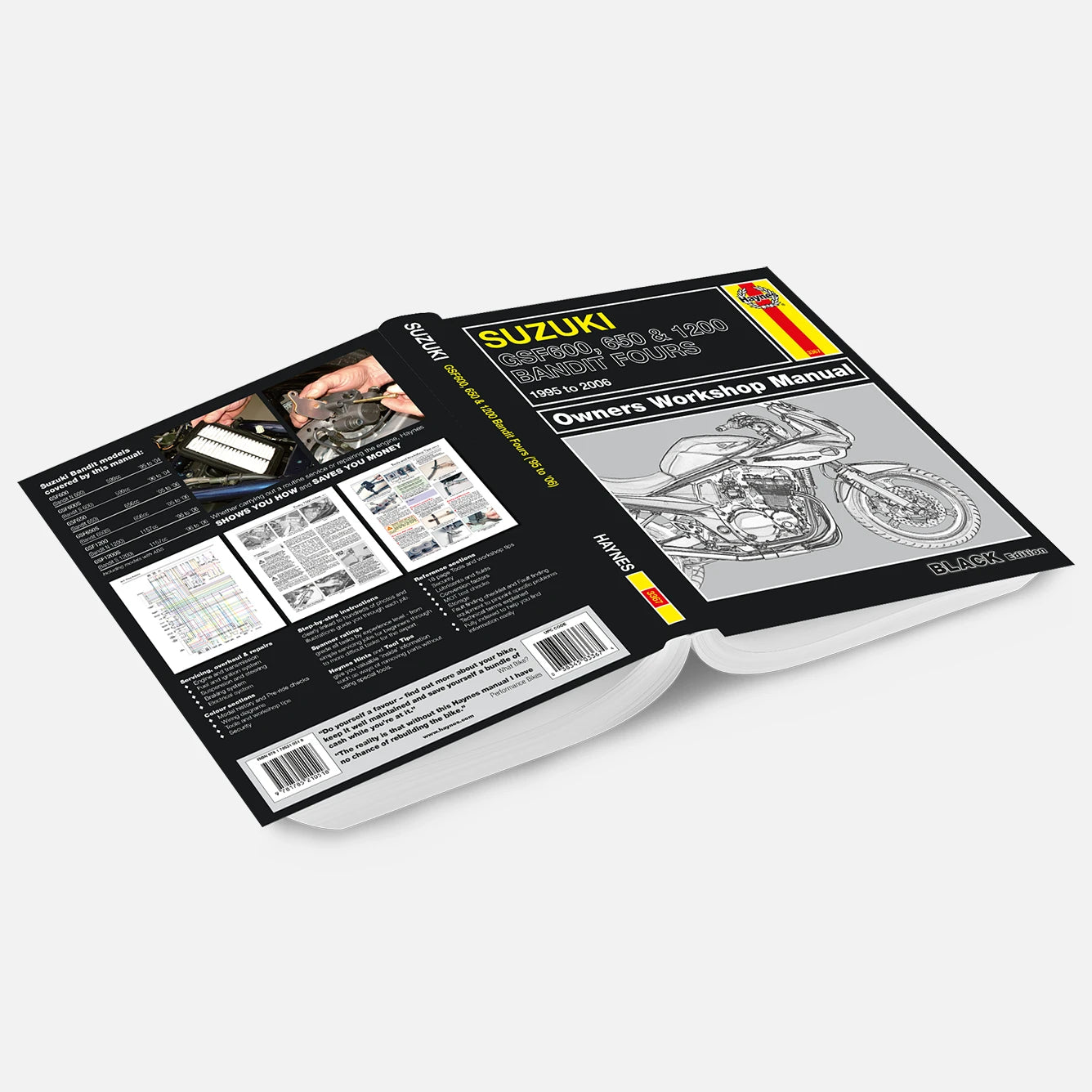 Open workshop manual for Suzuki motorcycle on a white background