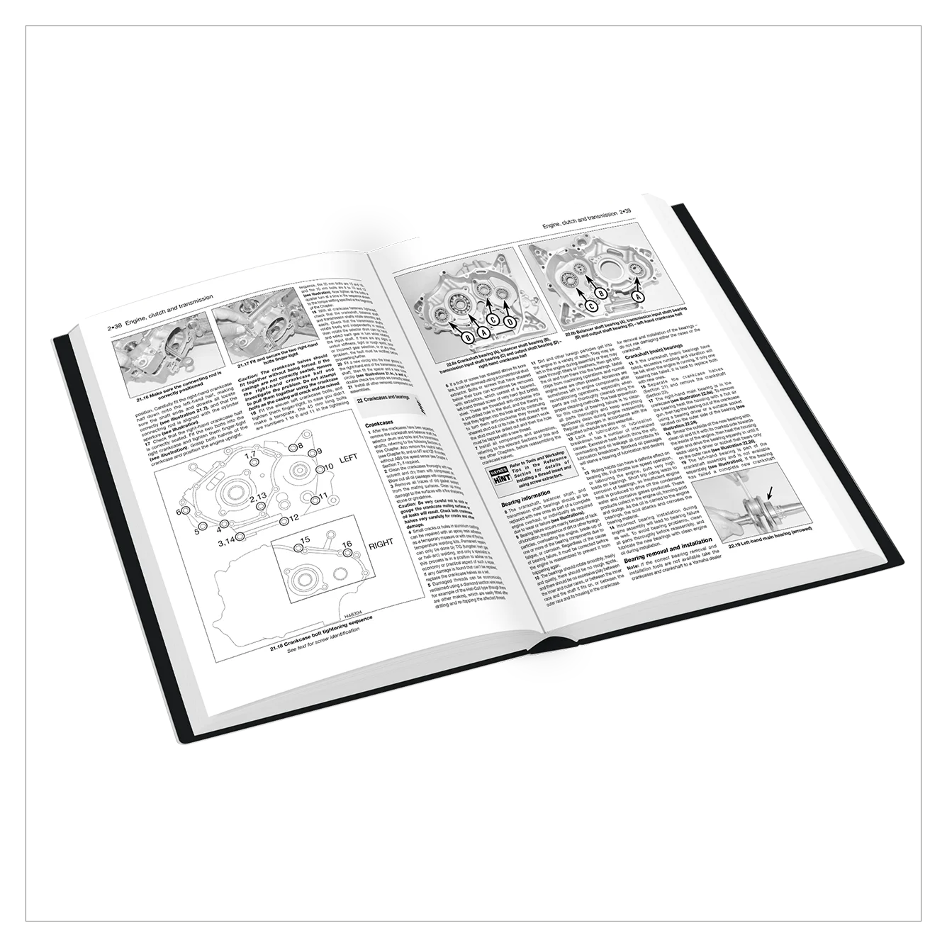Open book with text and diagrams on a white background