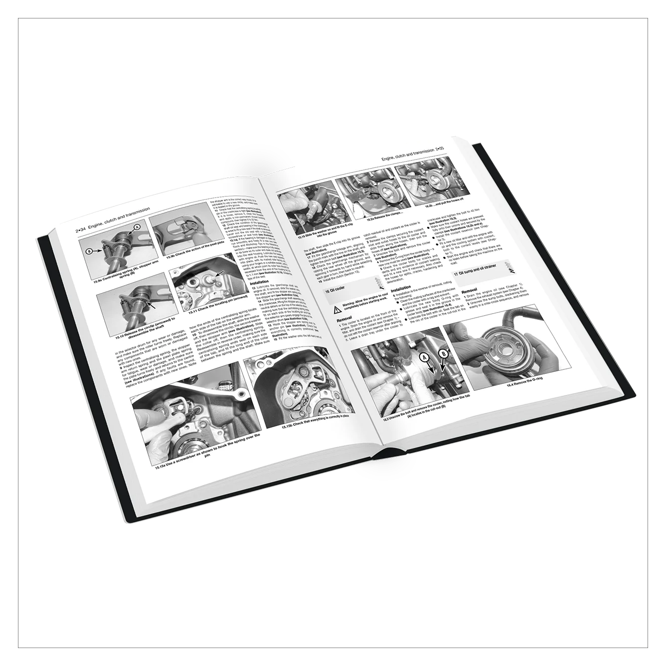 An open hardcover manual or book showing black-and-white instructional pages with text and small photos, photographed on a clean white background.